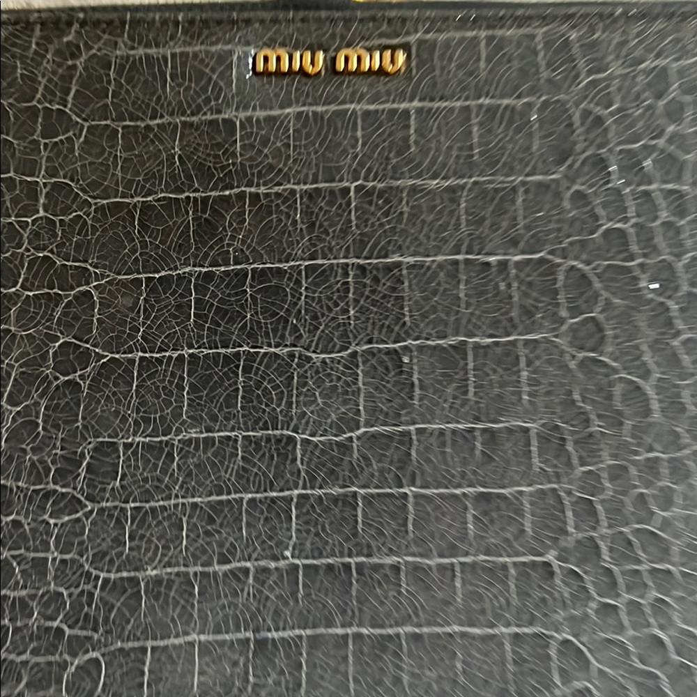 Miu Miu grey iPad carry case , side slot on inside , zips 3/4 around 11” 8.5” 1”